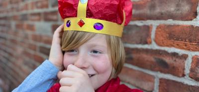 Child dressed in homemade crown