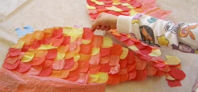 Picture of child making colourful wings