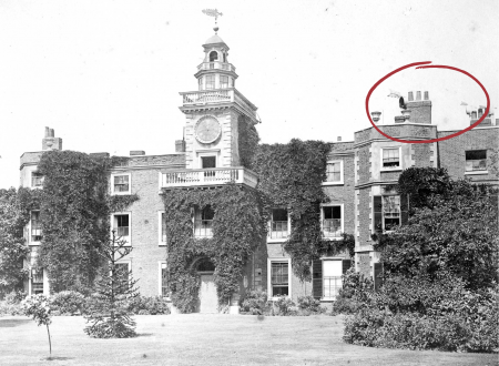 Image of tudor manor house with red circle indicating ventilation shafts