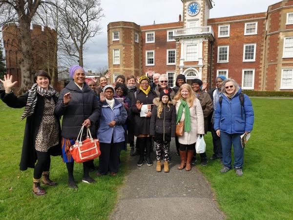 Members of a Tottenham walk outside Bruce Castle Museum