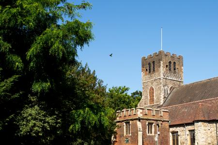 Medieval Priory with blue sky in the background