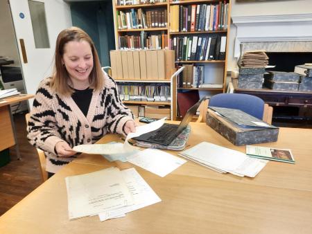person in archive search room