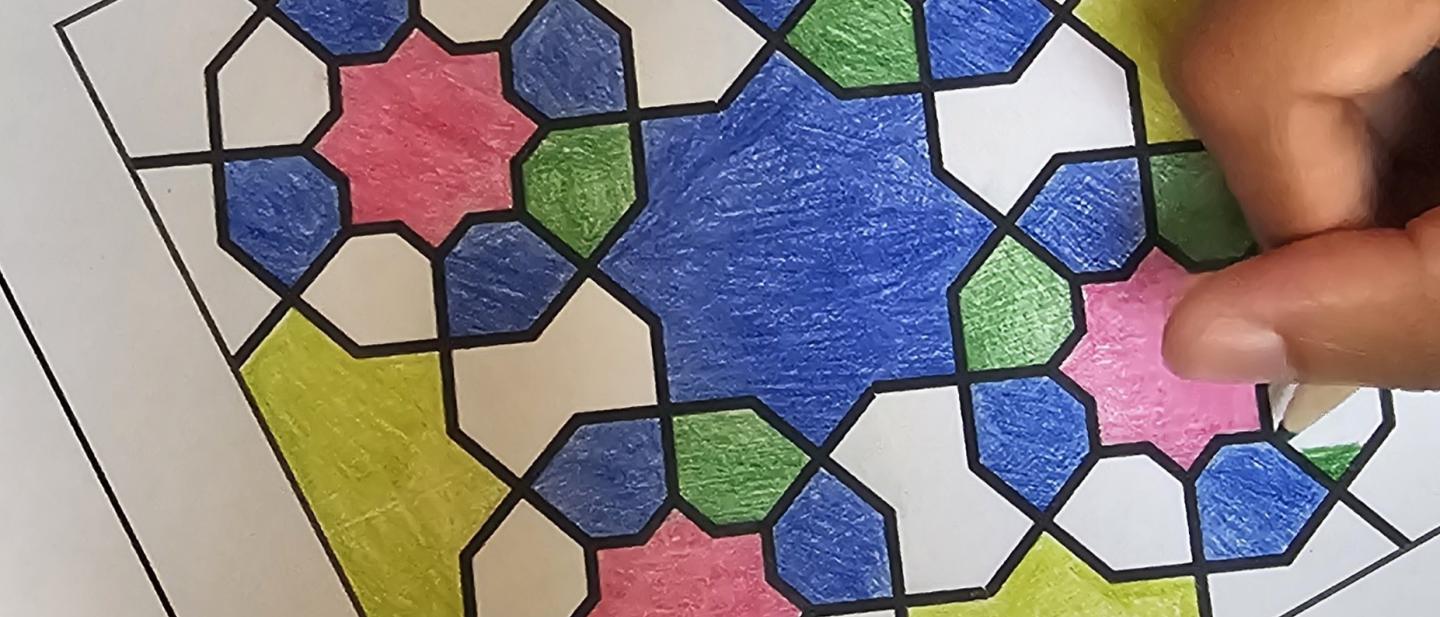Image showing someone colouring geometric patterns